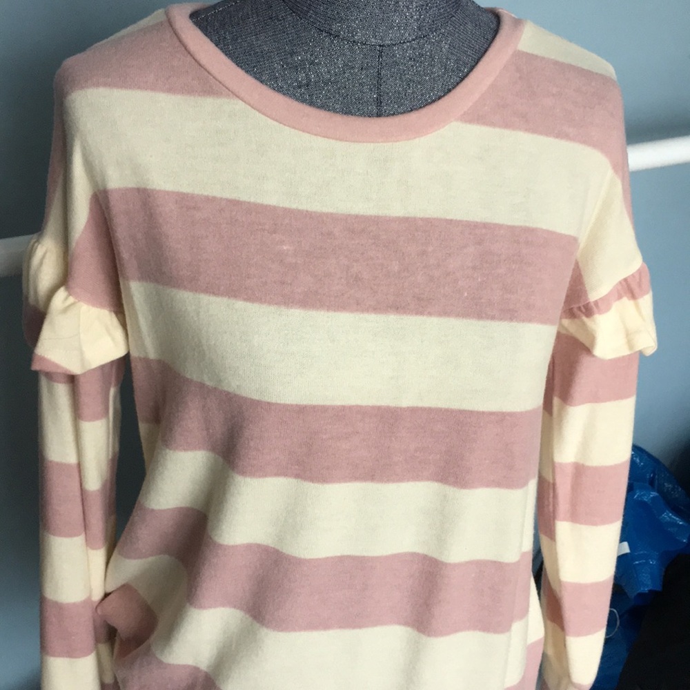 Pink and cream sweater with ruffle detail
